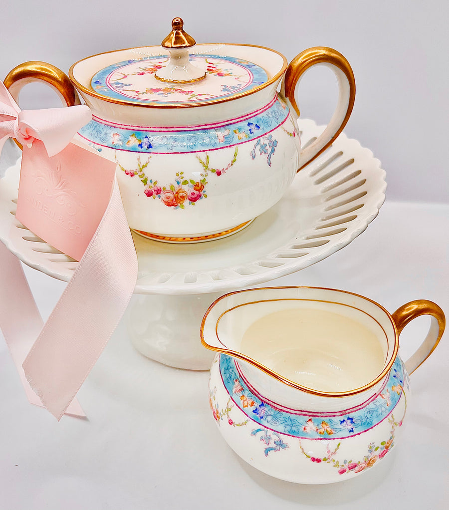 Aqua and gold dish and creamer set with pink accents